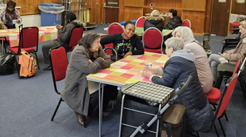Winnie with service users at the South London Mission